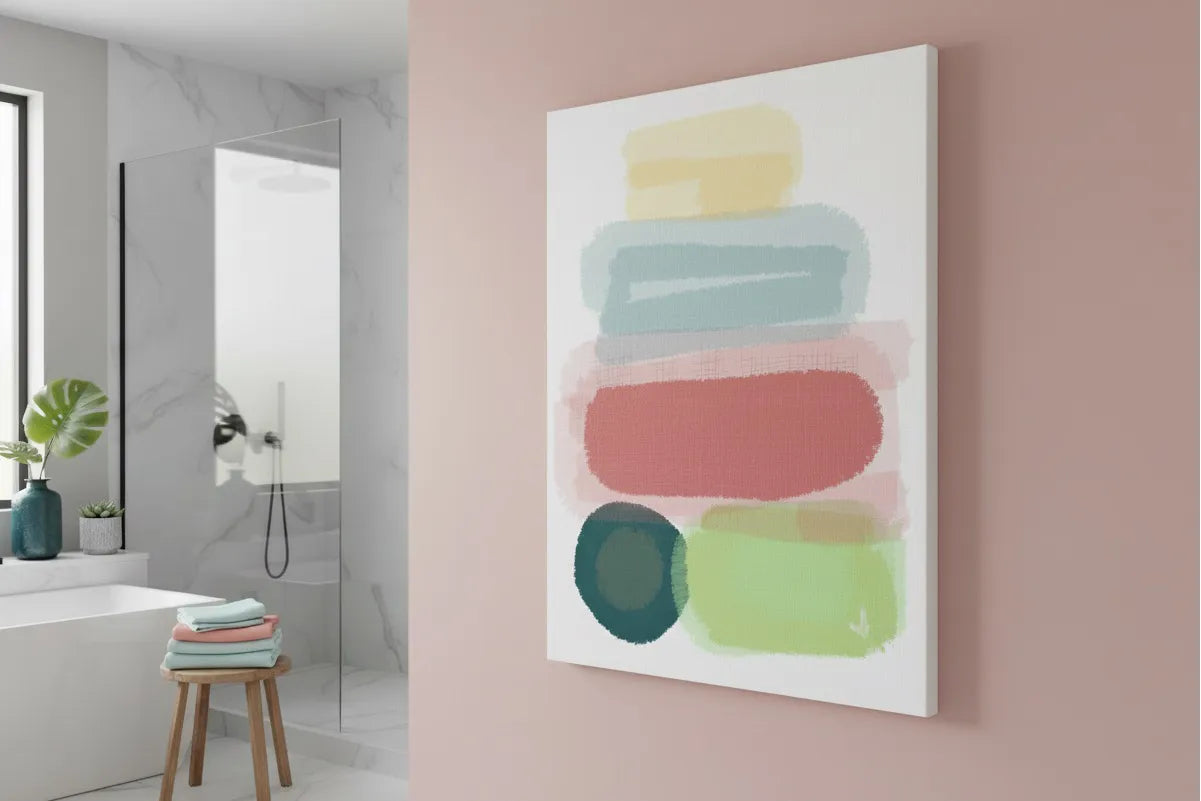 The Freebrd "Geo Req” 30x40 Modern Pastel Minimalist Wall Art on a 1.25 inch thick canvas hanging on a wall in a modern minimalist bathroom, showing an abstract folded towel artwork with fresh green, danish blue, adore pink, abstract teal and butter yellow designs. 