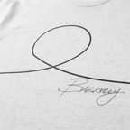 FREEBRD Minimalist Human Crew Tee, tri-blend heather white, close-up angle of hand-drawn minimalist human graphic and Basically script, fabric detail.