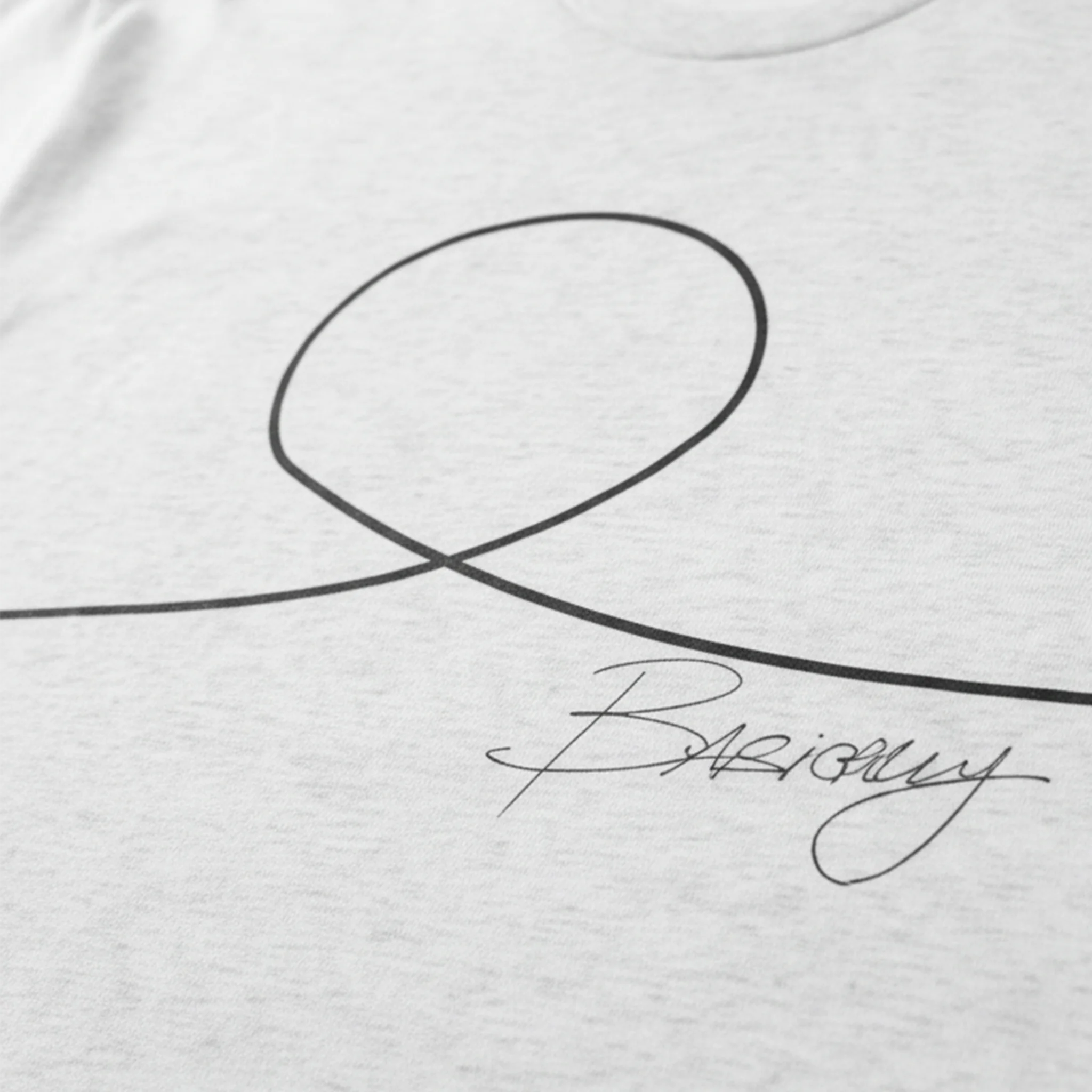 FREEBRD Minimalist Human Crew Tee, tri-blend heather white, close-up angle of hand-drawn minimalist human graphic and Basically script, fabric detail.