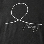 FREEBRD Minimalist Human Crew Tee, vintage black, close-up angle of hand-drawn minimalist human graphic and Basically script, tri-blend vintage black fabric detail.