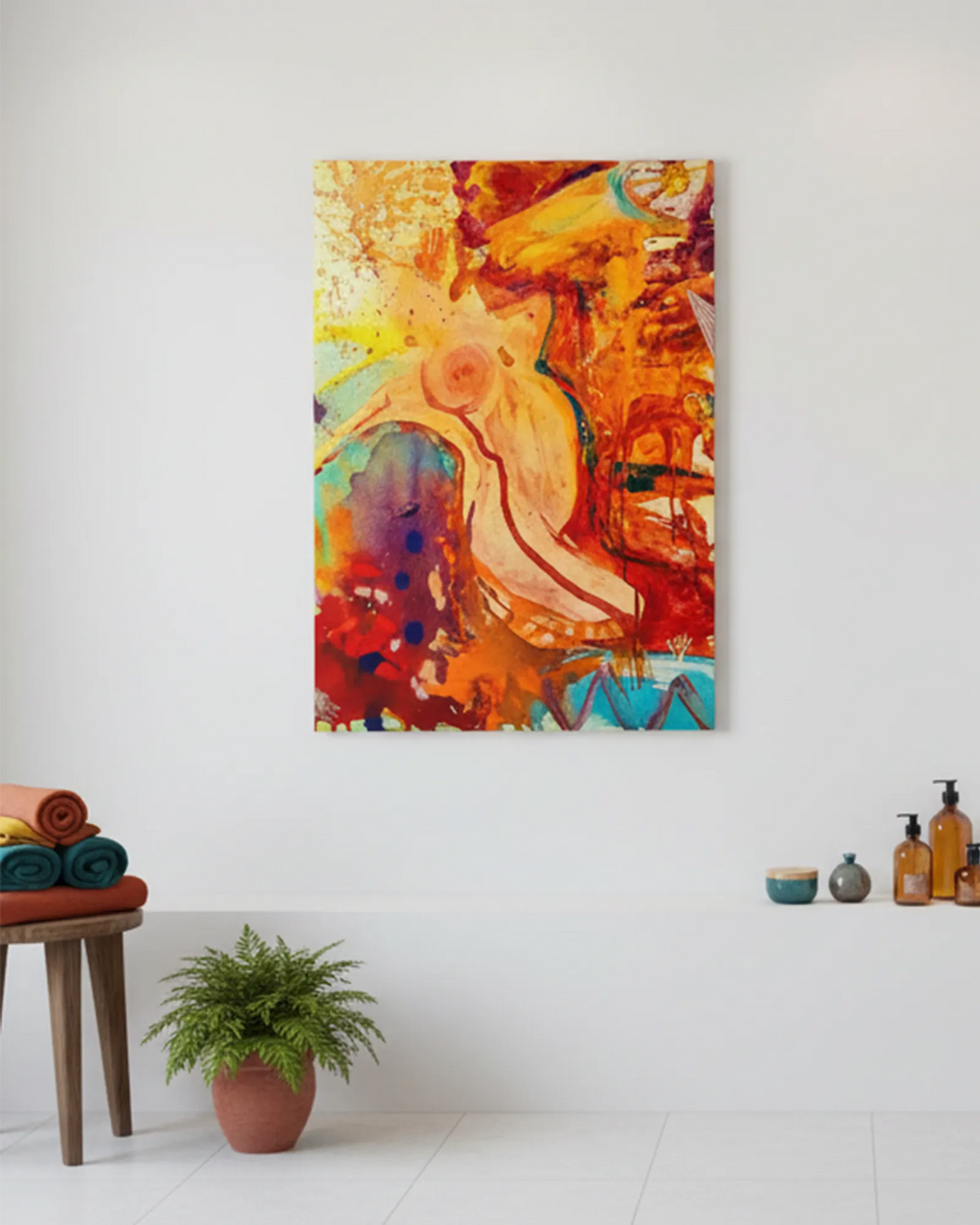 Colorful abstract ‘WWW’ FREEBRD canvas print on a white bathroom wall with a plant and small table with towels.