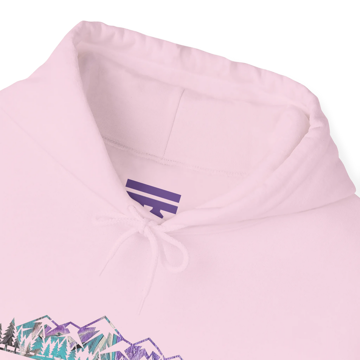 Close-up of a light pink hoodie neckline showing a purple inner-neck logo, pink drawstrings and part of the mountain graphic.