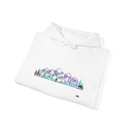 Folded white pullover hoodie showing a purple, turquoise and gray mountain and evergreen tree graphic, with the hood and drawstrings visible.