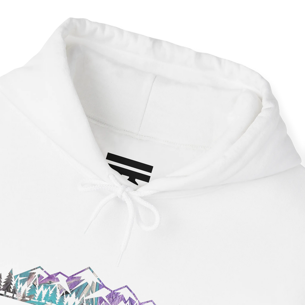 Close-up of a white hoodie neckline showing a black inner-neck logo, white drawstrings and part of the mountain graphic.