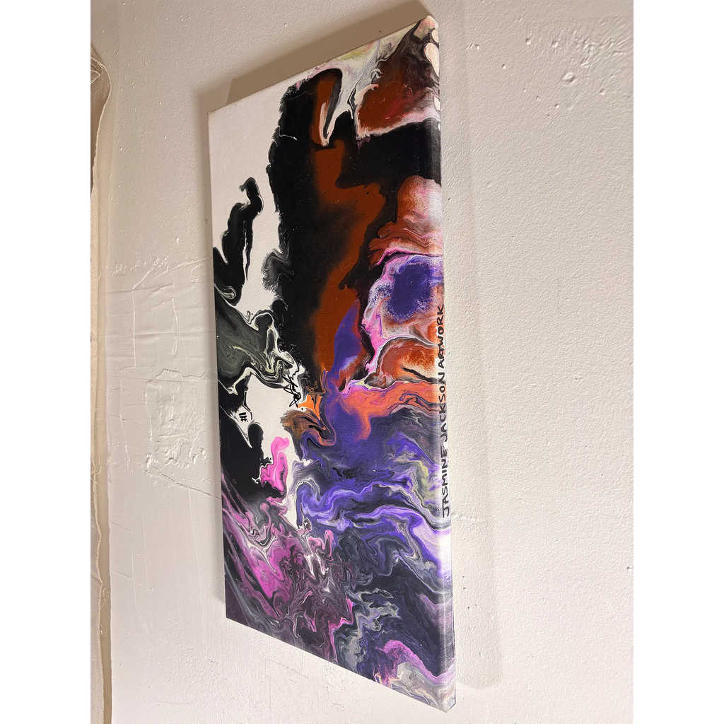 Mune Walk acrylic pour painting viewed at an angle, showing the canvas depth, marbled paint, and handwritten artist lettering along the edge.
