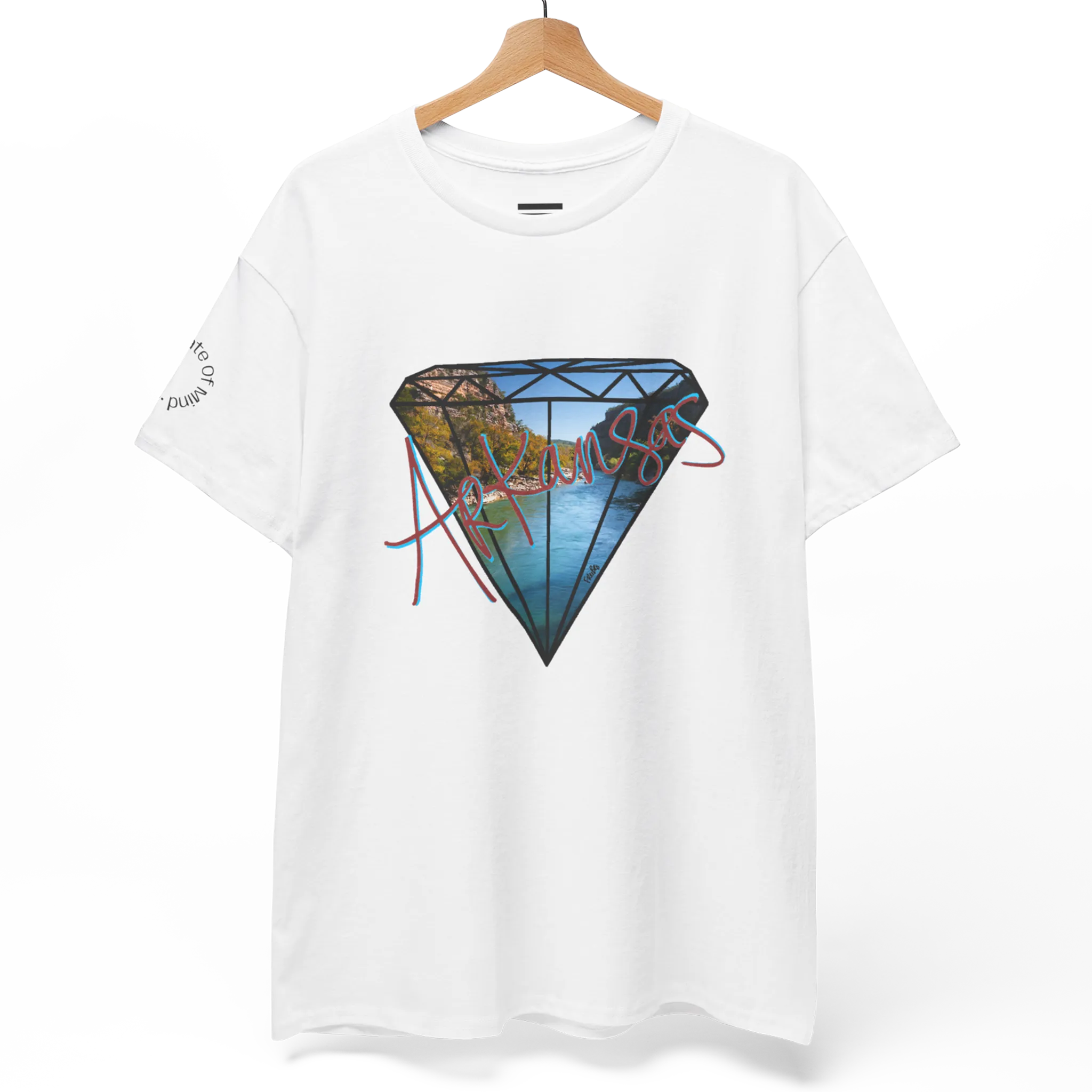 A white FREEBRD Natural State of Mind t-shirt on a hanger displaying the white diamond graphic with Arkansas river photo fill and red 'Arkansas’ script.