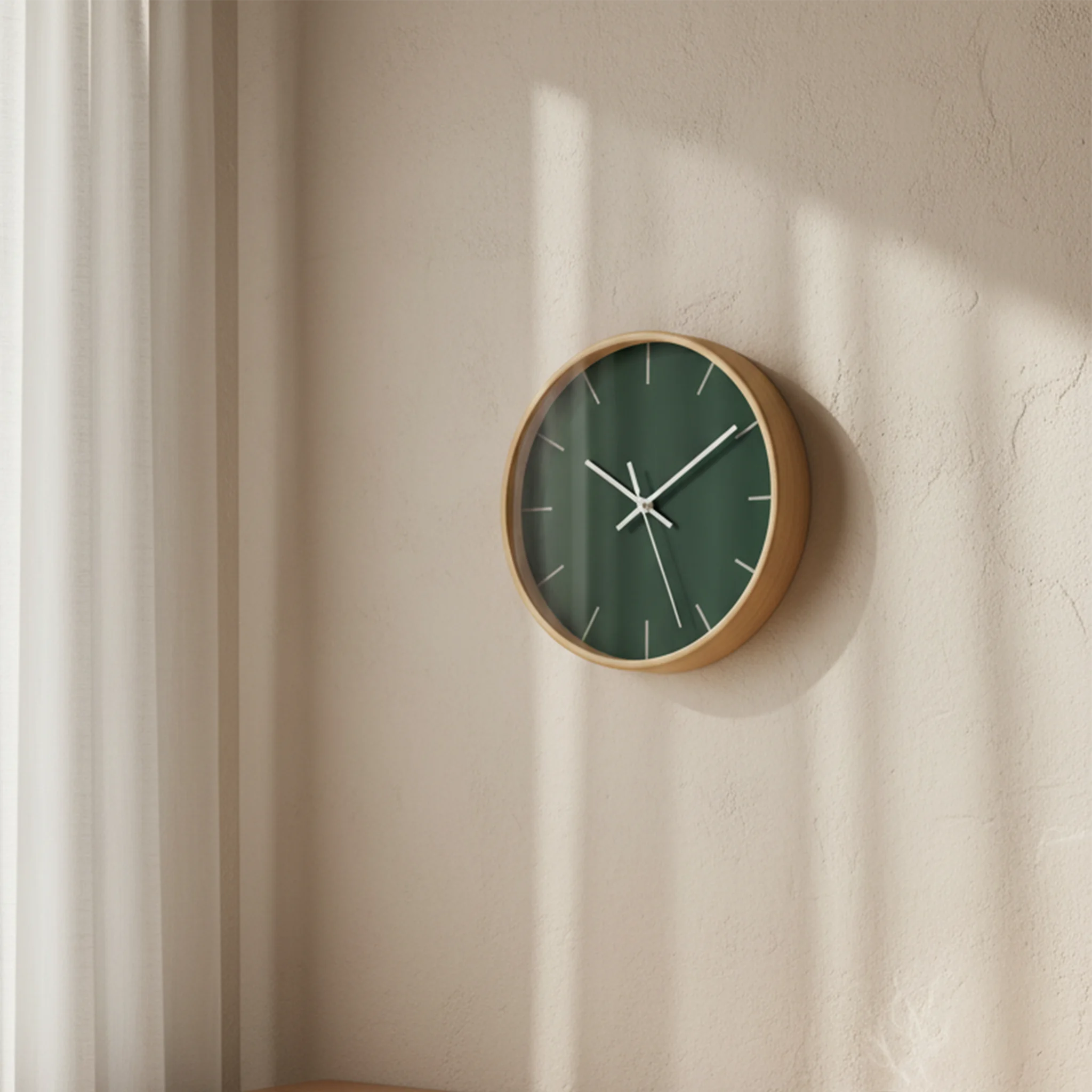 Stromboli Green Wall Clock hanging in  a cozy home office — natural wood frame.