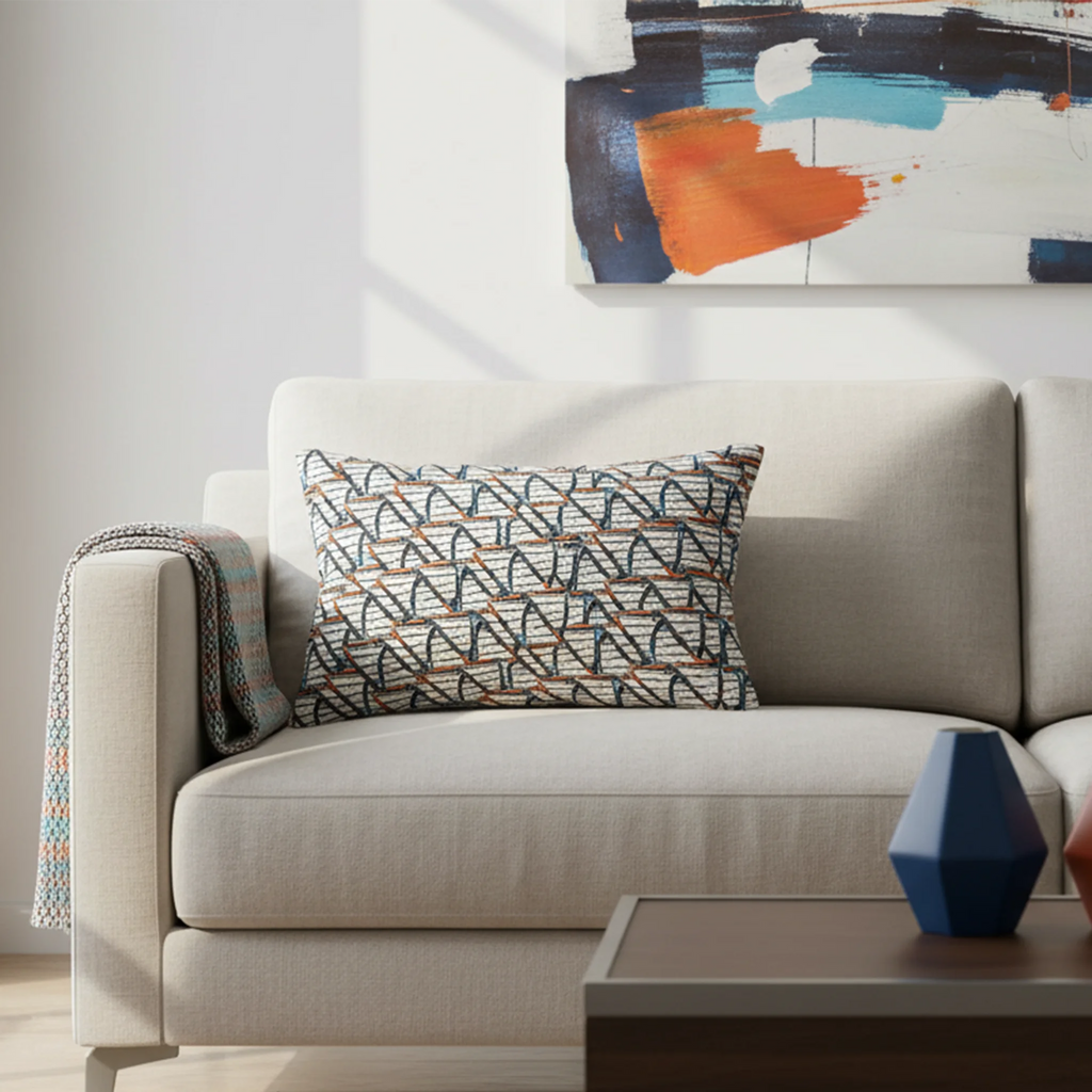 Nautical stripes pattern lumbar pillow styled on a couch in a modern living room. 