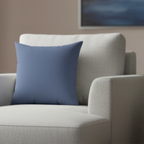 Navy dust faux suede pillow styled on a sofa chair, dark navy blue home decor.
