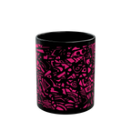Freebrd Medicolo neon pink abstract geometric pattern on a glossy black 11oz ceramic mug, front view.