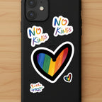 No Kings Pride Rainbow Vinyl Decal Set, stickers on black phone case, warm wood surface, FREEBRD Pride Gear.
