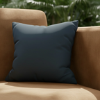 Nostradamus faux suede pillowcase styled on a couch in a modern botanical sunroom.