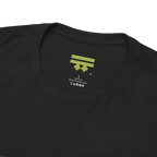 Black graphic tee collar detail showing FREEBRD branded inner label, size and care info visible.