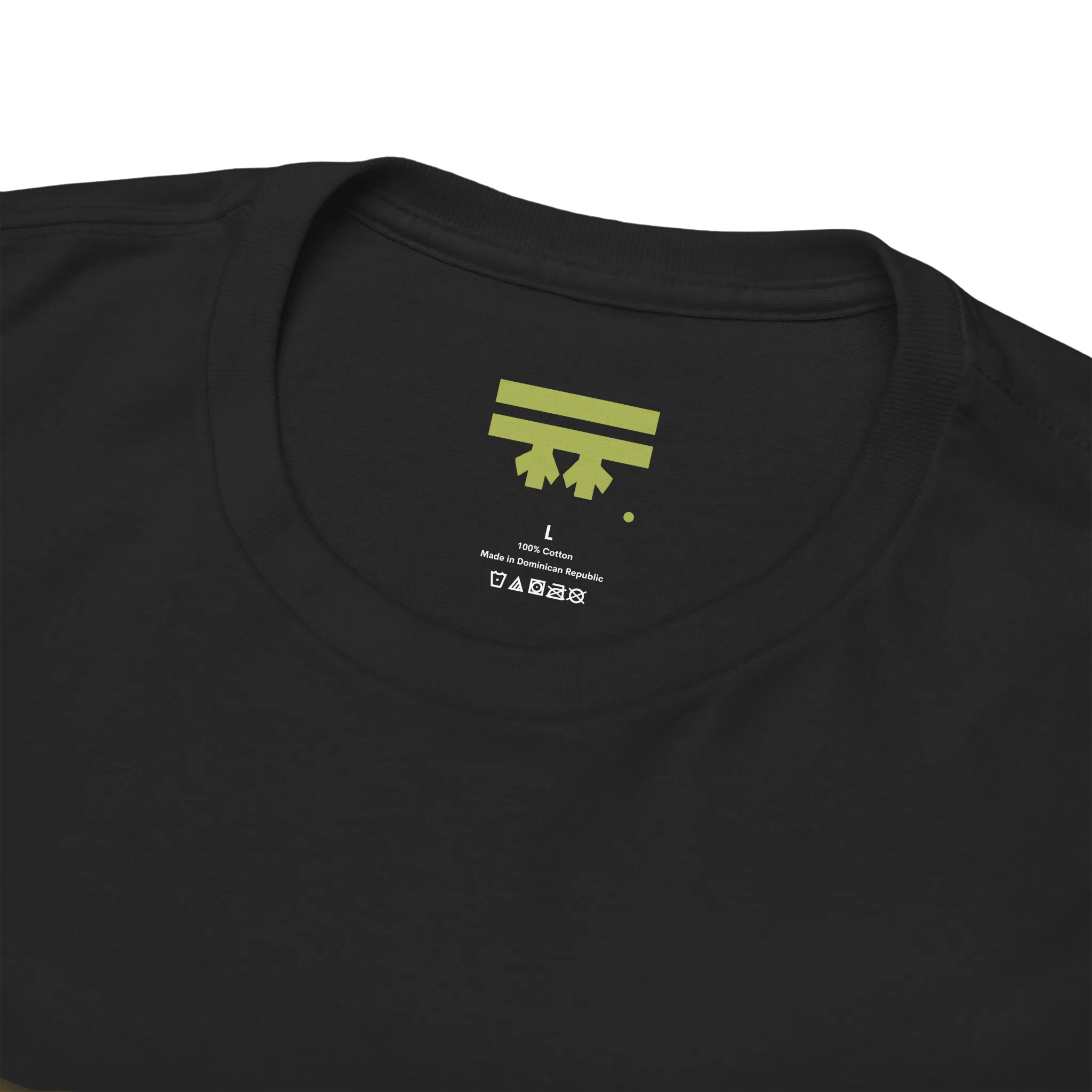 Black graphic tee collar detail showing FREEBRD branded inner label, size and care info visible.