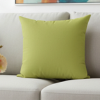 Orchid green faux suede throw pillow, styled in living room, lifestyle view.