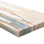 A side view showcasing the depth profile of the “Pastel Balla” 1.25 inch thick canvas.
