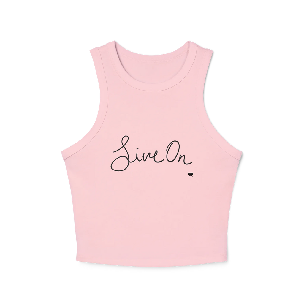 A pink cropped racerback tank top with a black cursive Live On script graphic on the chest.