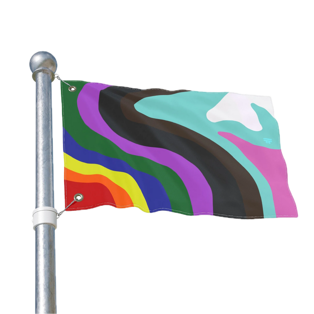 The Pride Rainbow Wave Flag mounted on a silver pole, showing the abstract wavy LGBTQ+ design with metal grommets.