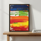 Primary Square Abstract Framed Canvas Art, true-to-scale size reference, 18″×24″ Vertical canvas leaned against wall on wooden bench with stacked books, 1.25″ deep black frame.