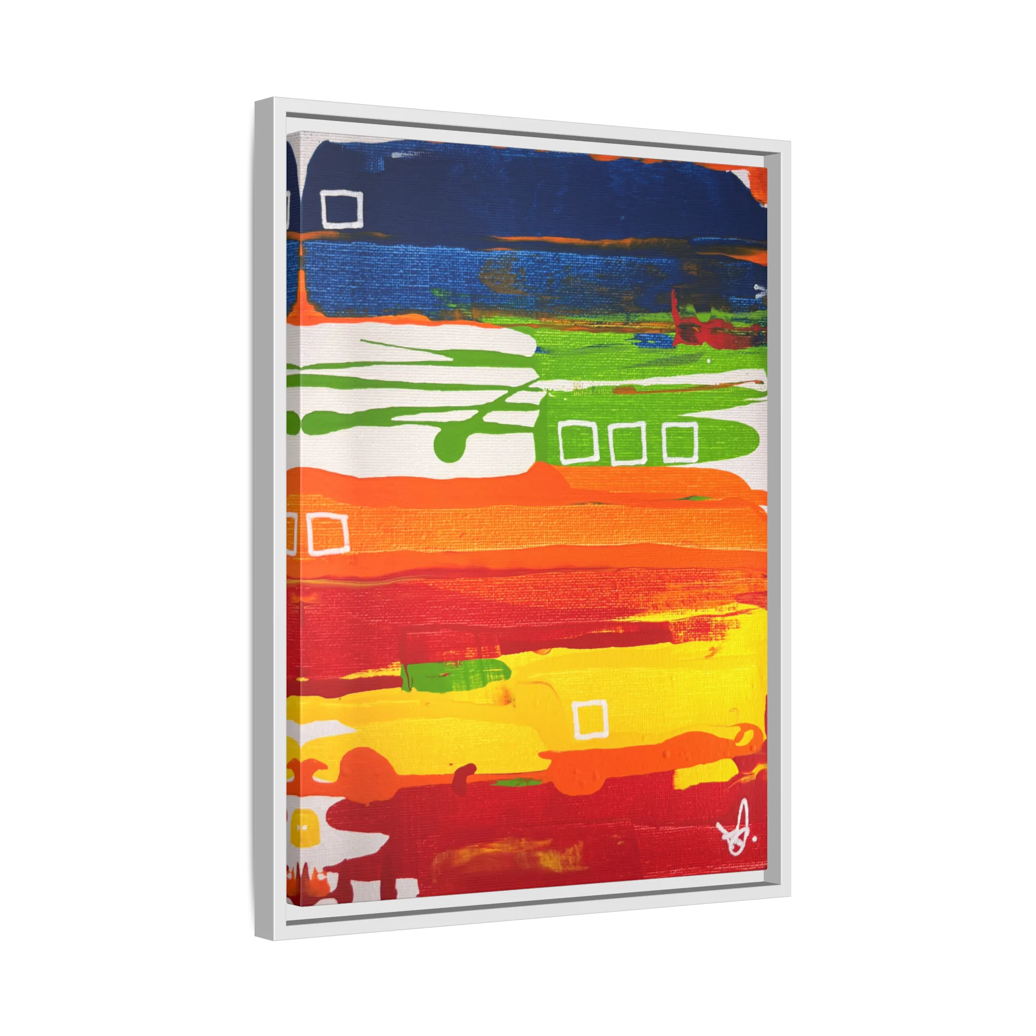 Side view of the "Primary Square" Framed Canvas Art by FREEBRD on a 1.25" canvas with an 18" x 24" Vertical frame, showcasing bold cobalt, grass green, tangerine and yellow horizontal bands with white square accents, framed in a white wood FSC certified frame.