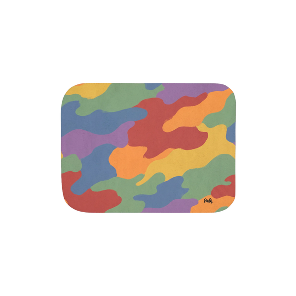 30 by 40 inch sherpa blanket, front view with red, orange, yellow, green, blue, and purple camouflage and a small black script logo near one corner.