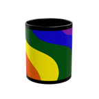 A straight on view of the black FREEBRD rainbow wave ceramic mug with a full wrap pride rainbow wave design in red orange yellow green blue and purple.
