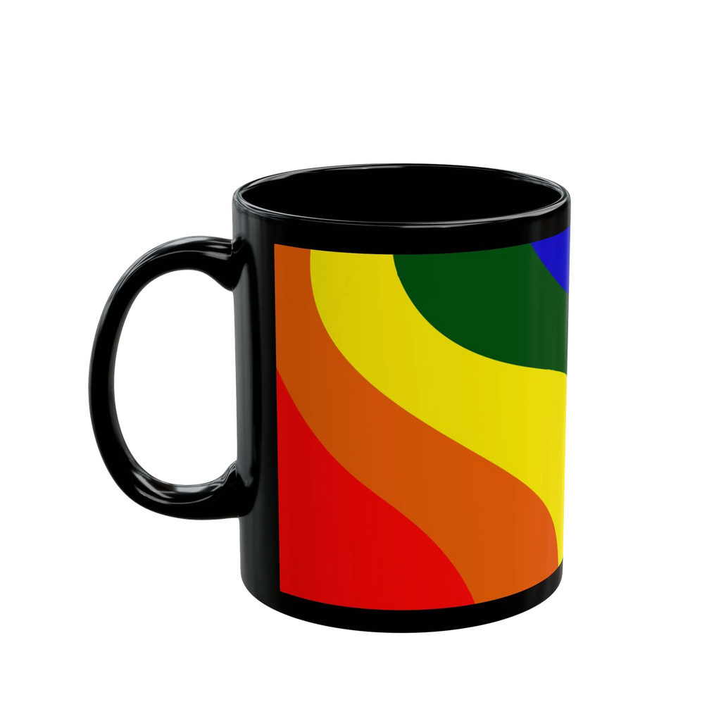 A right side view of the black FREEBRD rainbow wave ceramic mug showing bold rainbow wave design in red orange yellow green and blue.