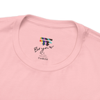 Pink FREEBRD tee collar detail, Be you heart label, rainbow logo, 100% cotton, Made in Honduras, care symbols.