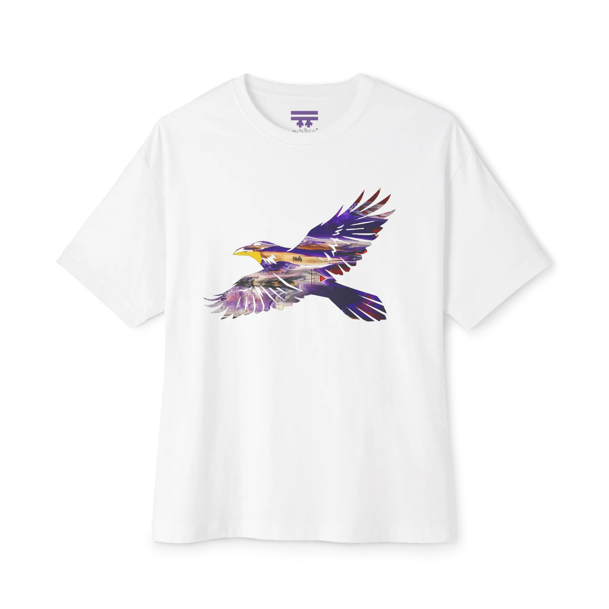 White boxy T-shirt with dropped shoulders and a flying raven filled with purple, gold, gray, and white abstract artwork, front view.