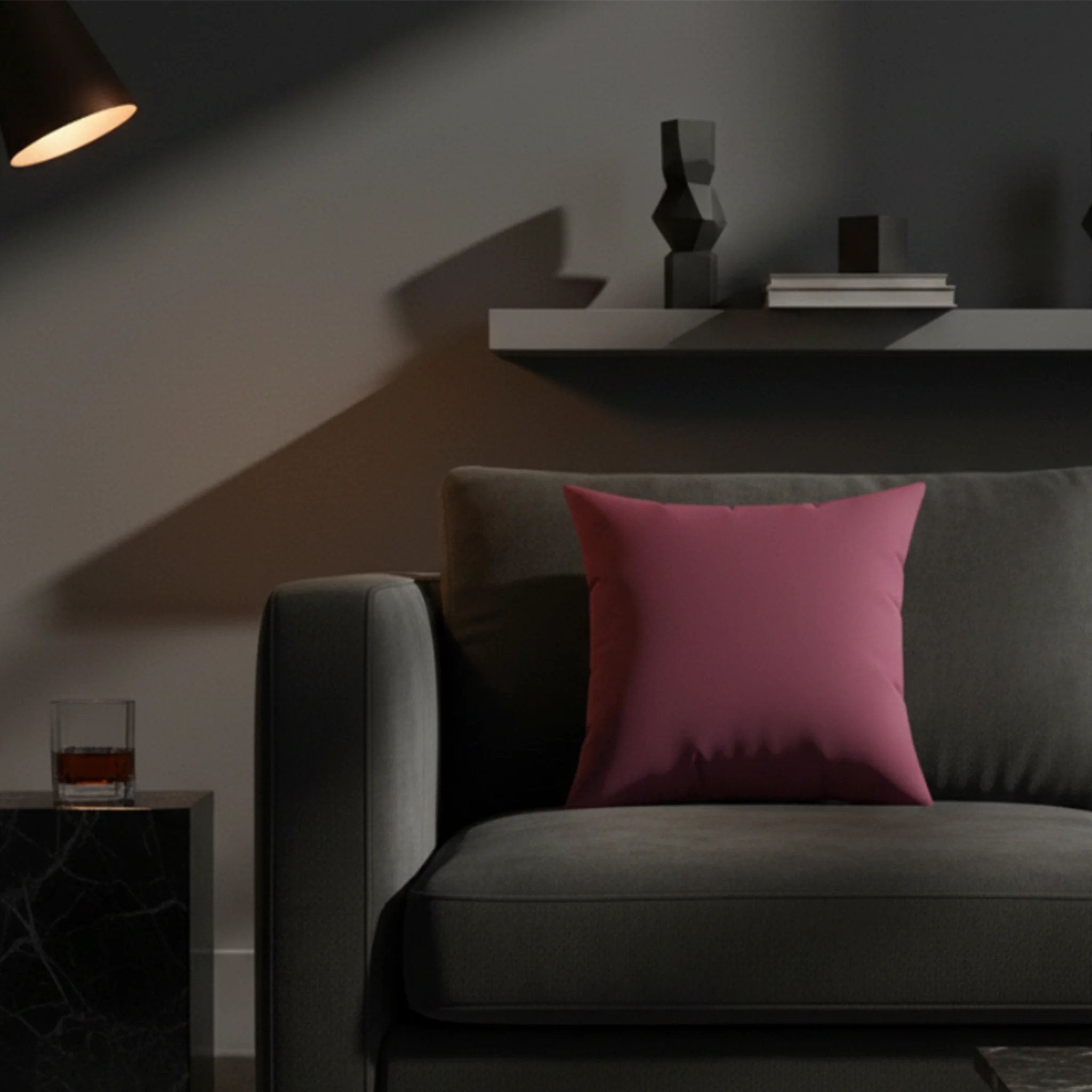 Red onion faux suede throw pillow styled on a sofa in a moody modern living room.