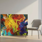 "Red Rain" 40x30 horizontal gallery-wrapped abstract canvas by FREEBRD leaning against a modern interior wall beside a contemporary accent chair — size reference for large horizontal abstract wall art decor.