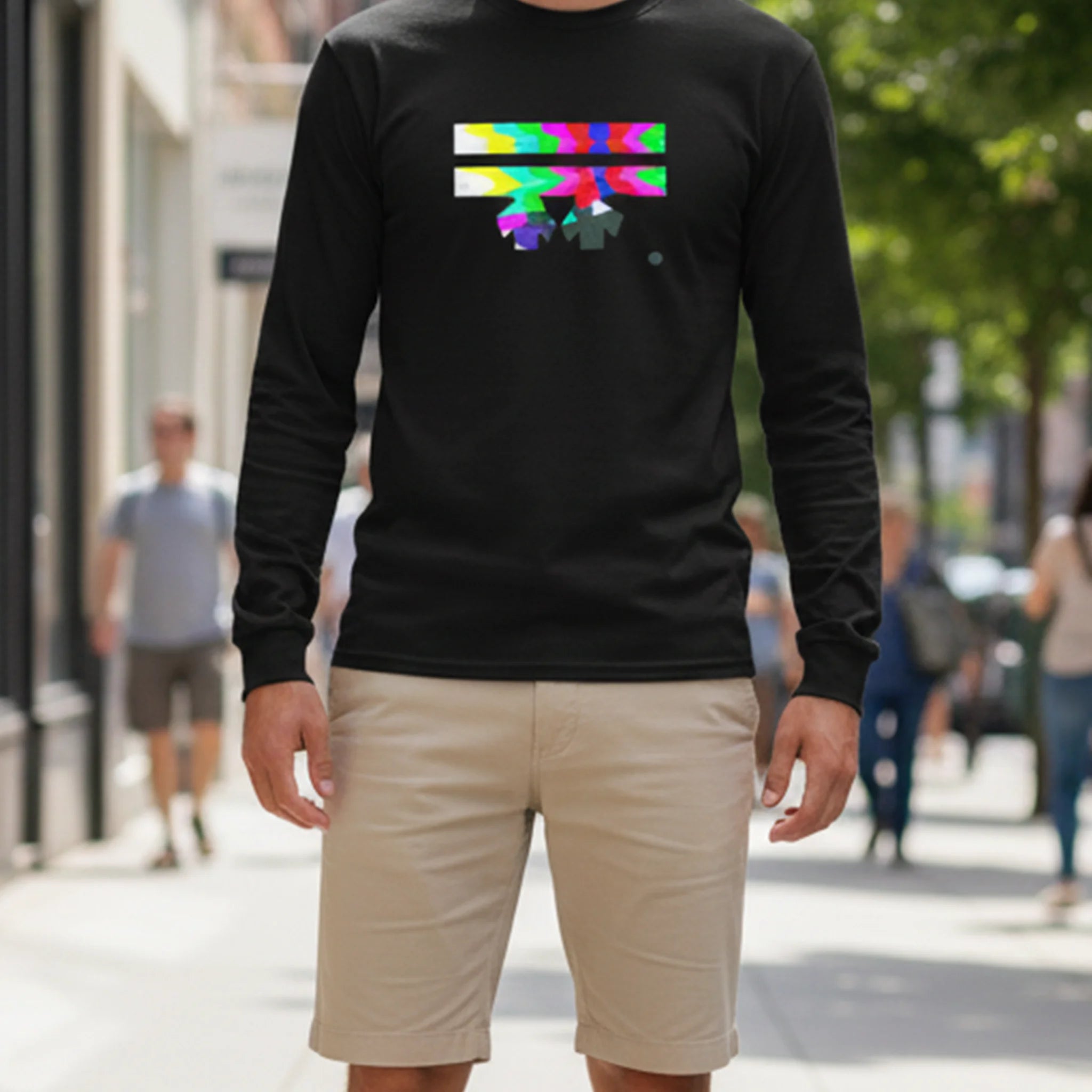 Black Retro Glitch long sleeve tee, FREEBRD logo in analog TV static glitch graphic, crew neck, styled lifestyle front view.