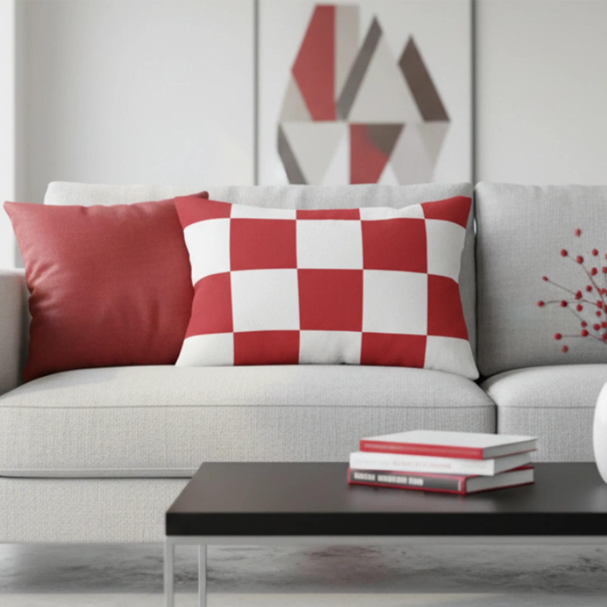 Retro red white checker lumbar pillow styled on a couch in a modern living room. 