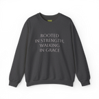 Dark grey heather crewneck sweatshirt with light-colored 'Rooted in strength, walking in grace' lettering across the chest, front flat lay.