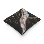 A side view of the Rose Gold Marble Woven Pillow showing rose gold veins and white marble with black veins on a charcoal background. 