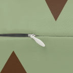 Sage chocolate triangle pattern lumbar pillow, zipper view.