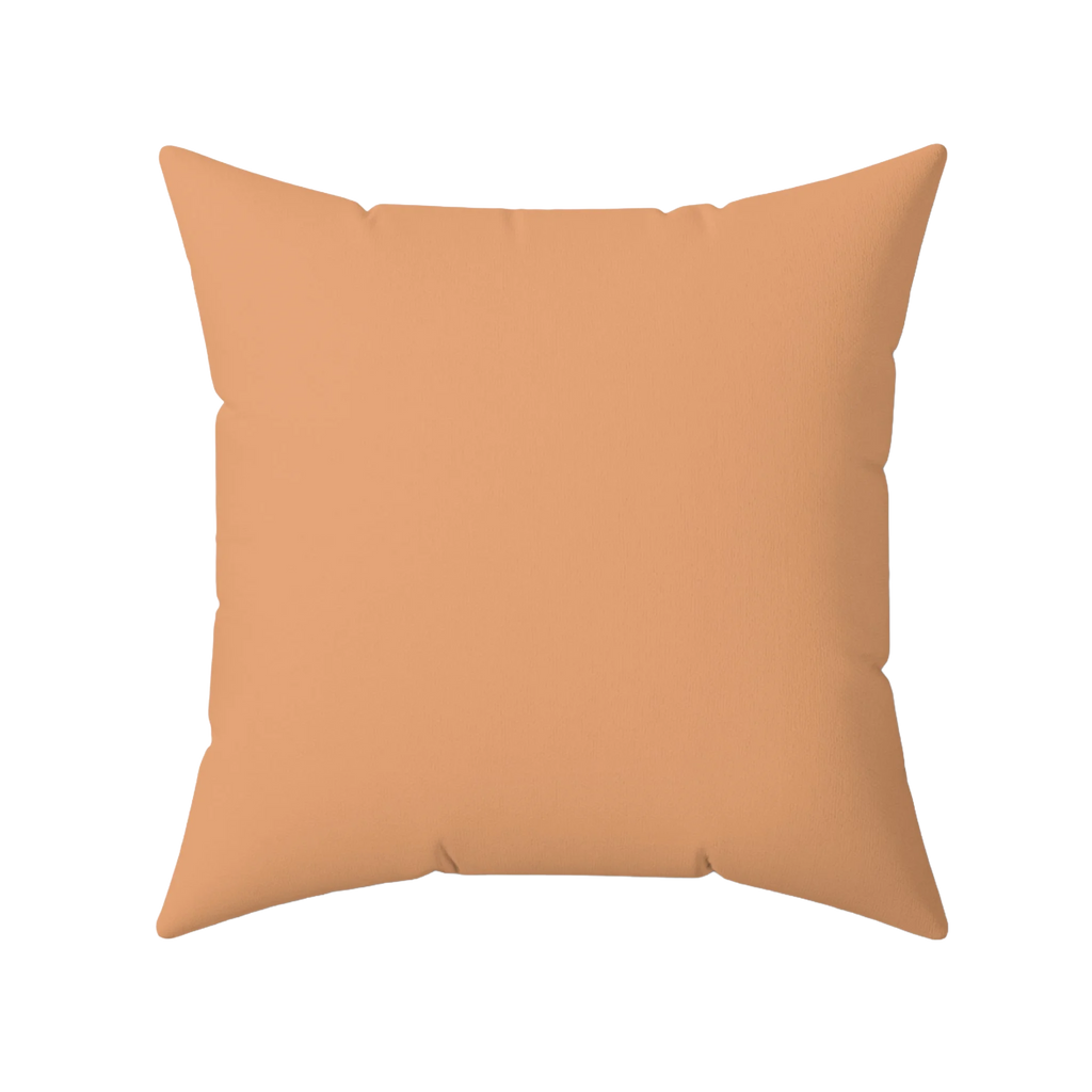 Sandy peach faux suede pillow, back view.