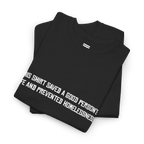 Black cotton t-shirt folded in a stack with the white printed front text visible at an angle.
