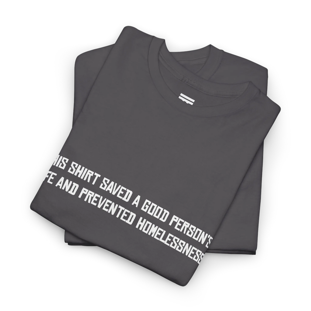 Charcoal cotton t-shirt folded in a stack with the white printed front text visible at an angle.