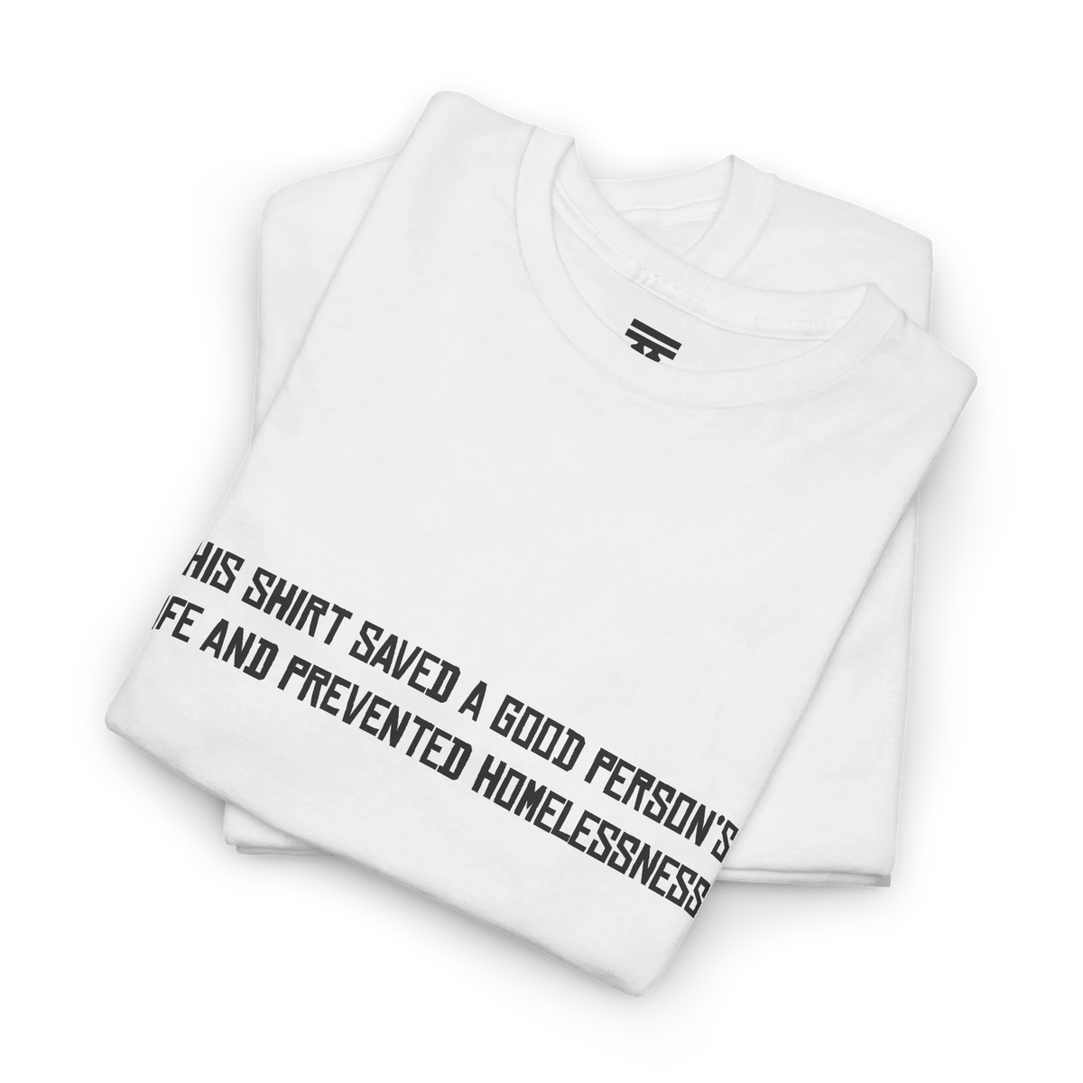 White cotton t-shirt folded in a stack with the black printed front text visible at an angle.