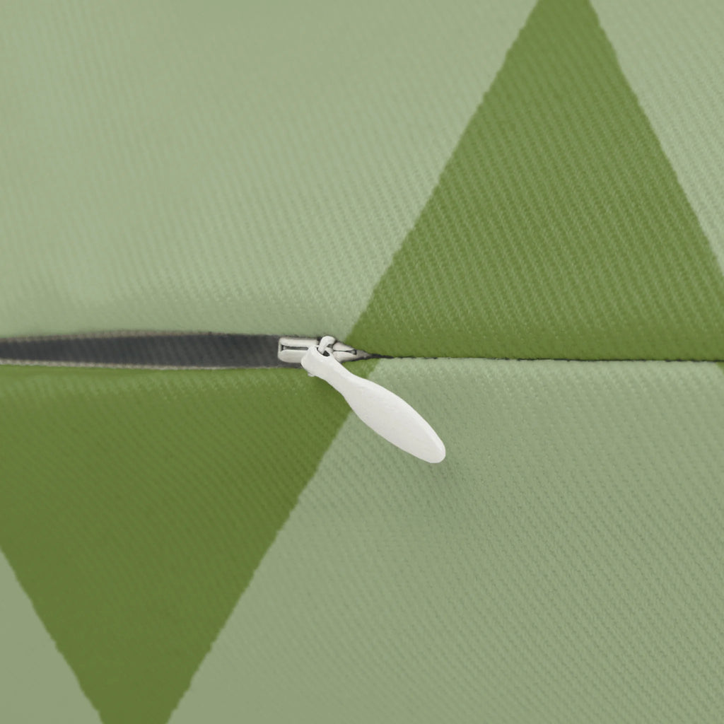Schist olive green geometric triangle lumbar pillow, zipper view.