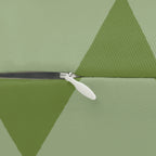 Schist olive green geometric triangle lumbar pillow, zipper view.