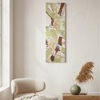 Slim Sage abstract vertical canvas art in minimalist living room, sage green, espresso and tan palette knife scrapes, unframed canvas above boucle chair with dried stem and olive ceramic vase, warm natural light.
