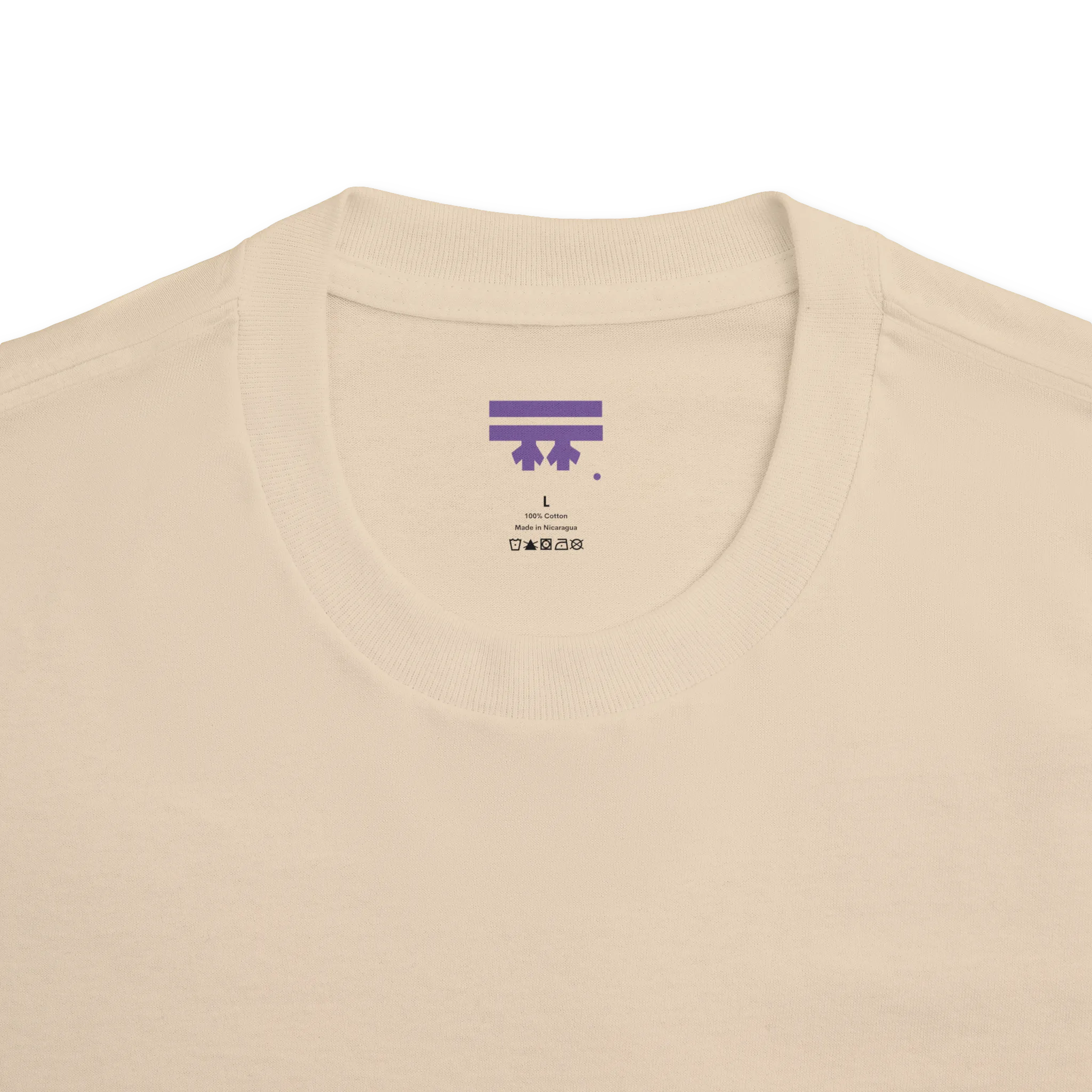 Classic fit crew neck tee, sand, collar close-up showing FREEBRD brand label, 100% cotton.