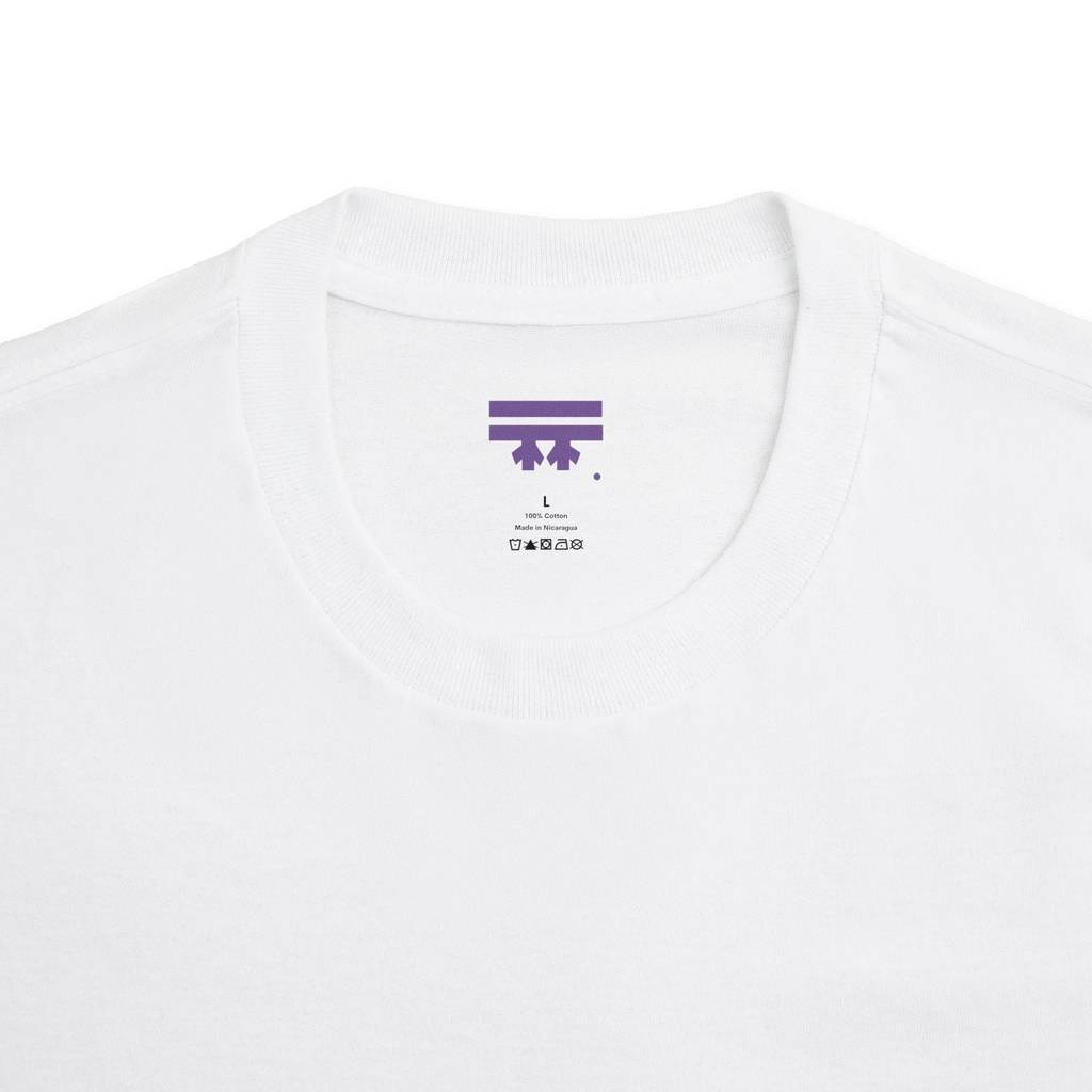 Classic fit crew neck tee, white, collar close-up showing FREEBRD brand label, 100% cotton.