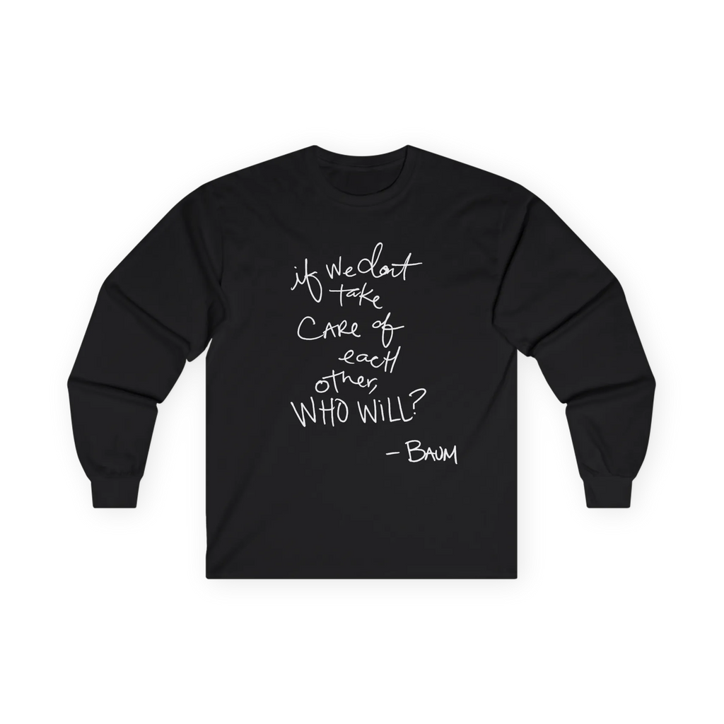 Black long-sleeve top, front view, with a white handwritten If we don’t take care of each other, who will quote.