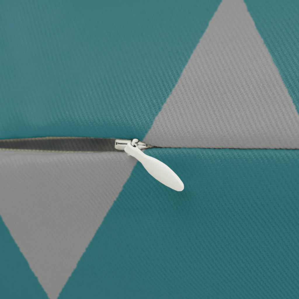 Teal stardust grey geometric triangle lumbar pillow, zipper view.