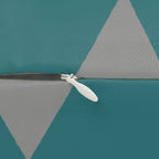 Teal stardust grey geometric triangle lumbar pillow, zipper view.