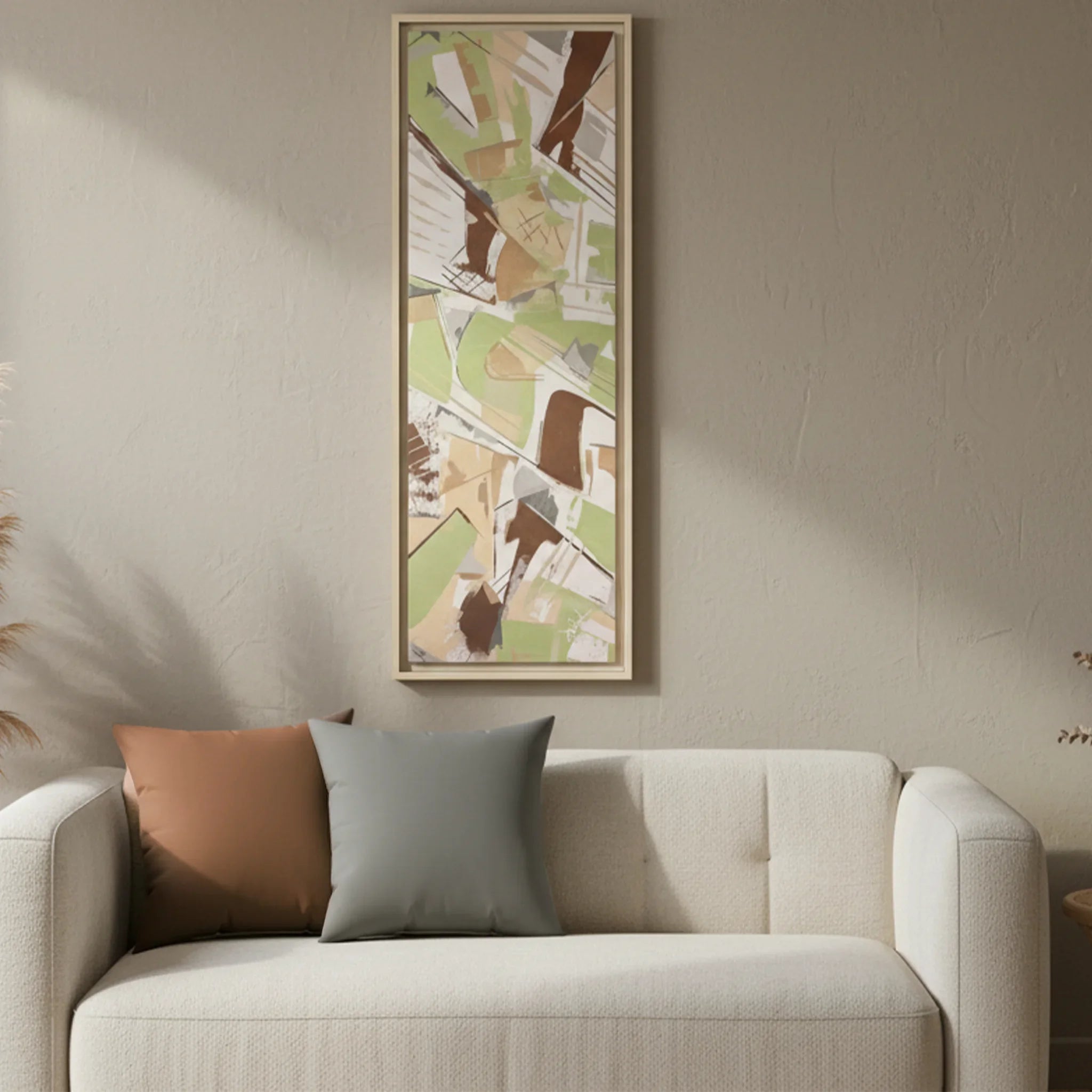 Natural wood framed Slim Sage canvas art with atomic grey and saddle brown faux suede pillows, living room lifestyle, 12x36.