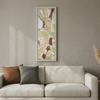 White framed Slim Sage abstract canvas art above cream linen sofa, Saddle Brown and Atomic Grey faux suede pillows, minimalist living room lifestyle.